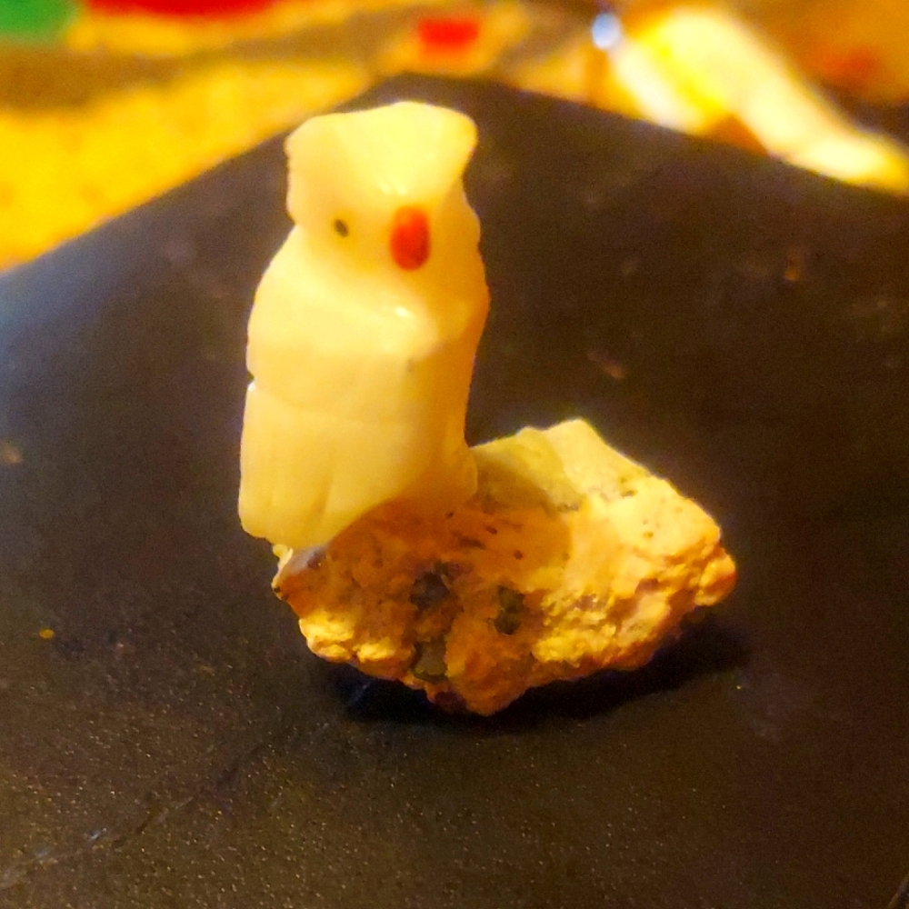 Hand Carved Crystal Owl Poached On A Rock